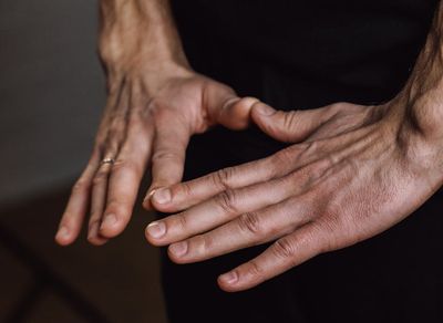 Close-up of hands in a meditation mudra.